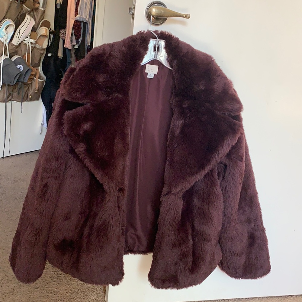 Puffy faux fur purple coat